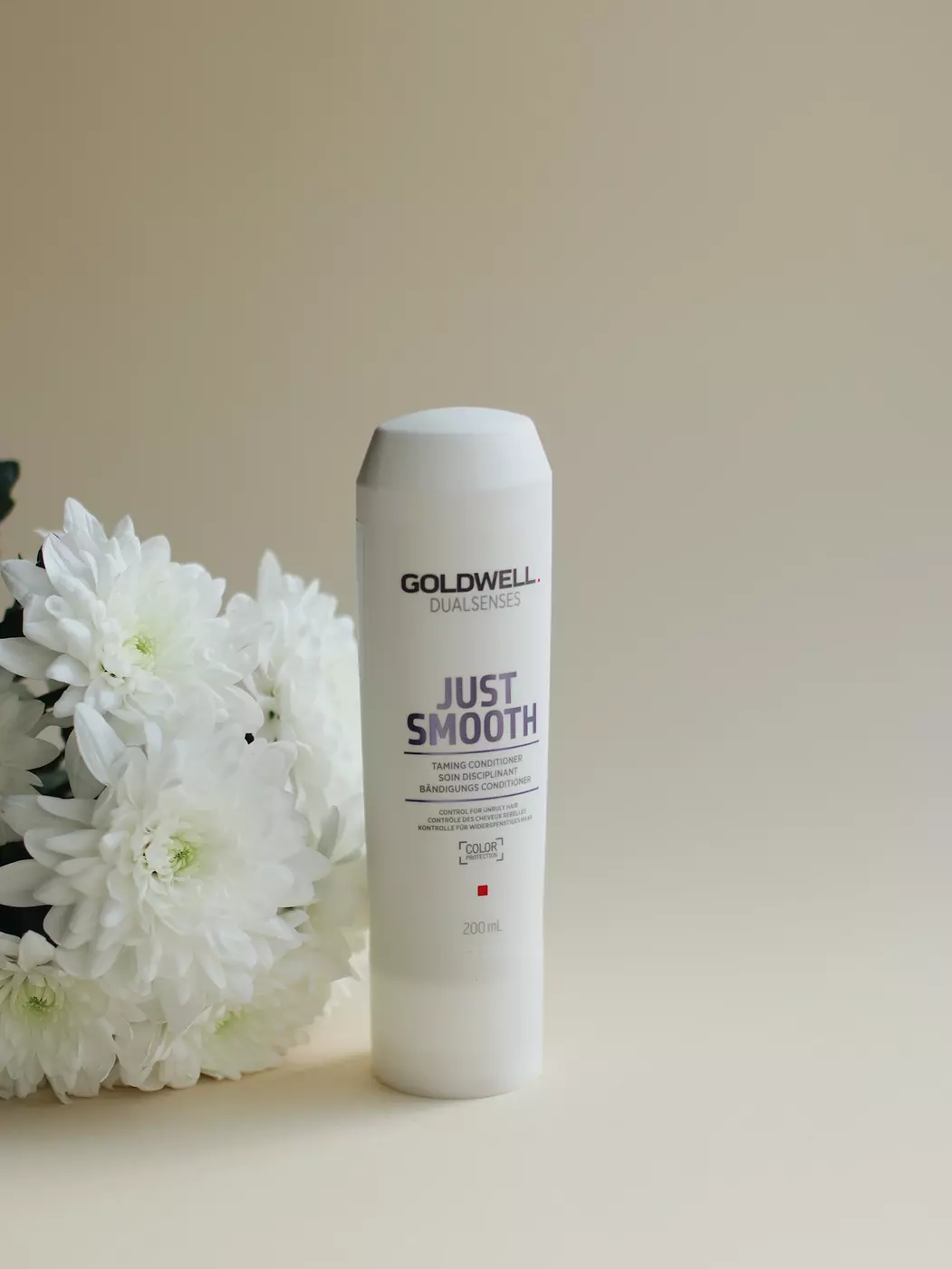 Кондиціонер для розгладження неслухняного волосся GOLDWELL DUALSENSES JUST SMOOTH TAMING CONDITIONER