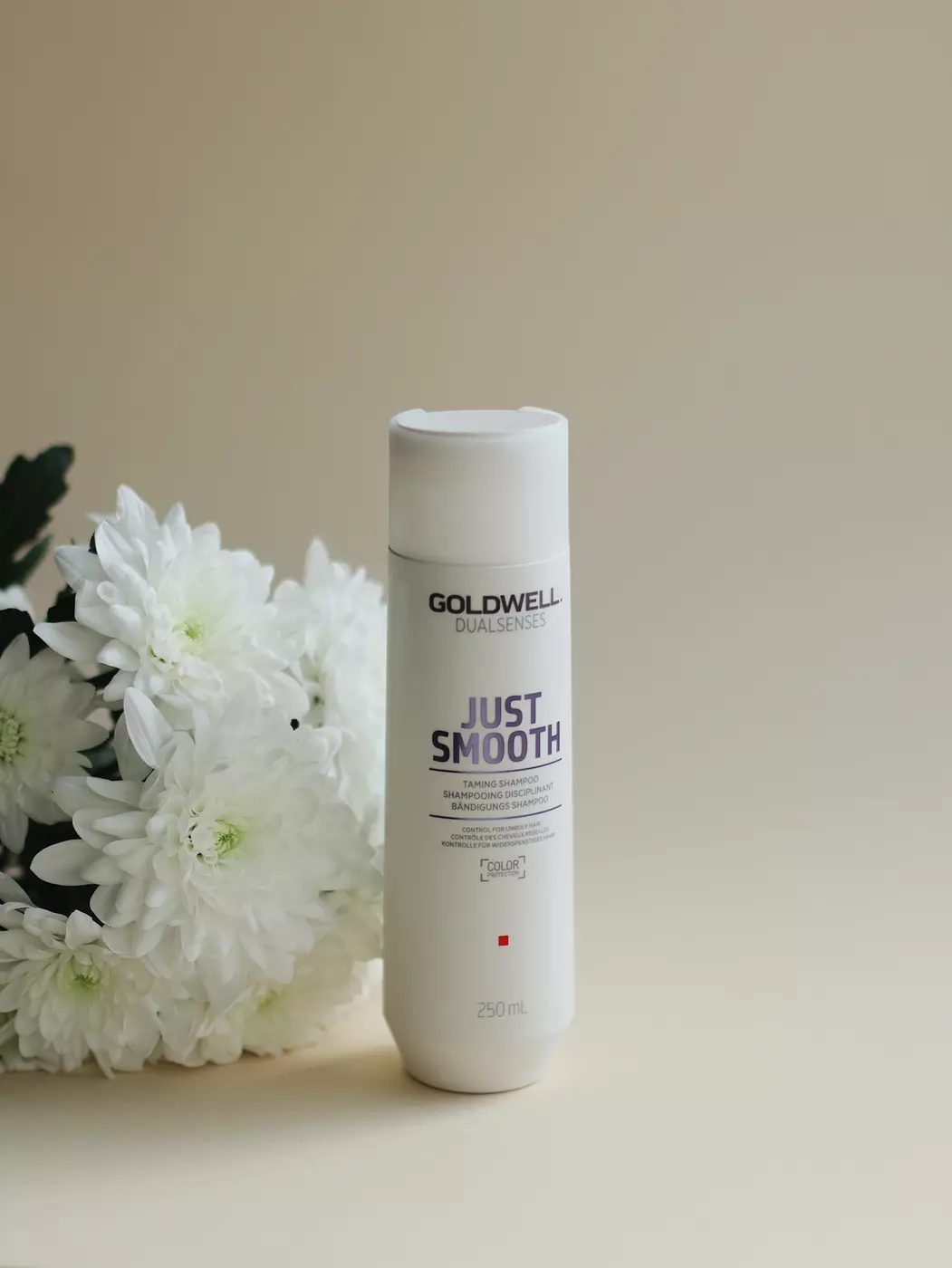 Шампунь для розгладження неслухняного волосся GOLDWELL DUALSENSES JUST SMOOTH TAMING SHAMPOO